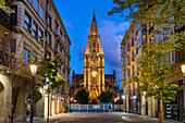 Bell Tower of gothic Cathedral of Good Shepherd or Catedral del buen pastor in Donosti San Sebastian city, north of Spain, Euskadi, Euskaerria, Spain.