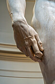 Detail of the hand of the original David statue by Michelangelo in the Accademia Gallery in Florence, Italy.