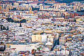 An overhead shot of Seville showcases the unique Las Setas structure against the skyline, blending modern and traditional architecture.