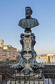 Bronze bust of master goldsmith & sculptor Benvenuto Cellini on the Ponte Vecchio in Florence, Italy.