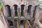 Ruins of a building in the Roman Forum in the Colosseum Archaeological Park in Rome, Italy.