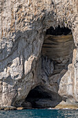 Stalactites in the White Grotto in the limestone cliffs of the coast of the island of Capri, Italy.