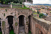 Ruins of a building in the Roman Forum in the Colosseum Archaeological Park in Rome, Italy.