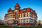 The Lunenburg Academy is a historic school building built in 1885 and is designated a National Historic site. It is built in the Second Empire architectural style and currently houses a library and music school, Lunenburg, Nova Scotia, Canada.