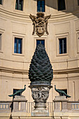 Bronze pinecone sculpture in front of the Terrace of the Niche, Vatican Museums, Vatican City, Rome, Italy.