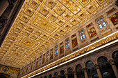 The ornate ceiling of the transept of the Basilica of St. Paul Outside the Walls, Rome, Italy.