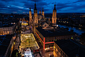 Aerial view of the Cathedral Basilica of of Our Lady of the Pillar and El Pilar square illuminated at night during Christmas, Zaragoza, Spain