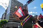 Supporters of Nicolas Maduro's government celebrate on their platforms, prior to the presidential swearing-in on January 10, 2025.