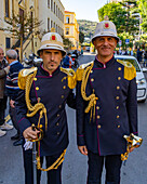 Two Italian policemen in dress uniforms after a war memorial ceremony in Sorrento, Italy.