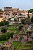 View of the Colosseum and Arch of Titus and the Roman Forum from Palatine Hill in Rome, Italy.