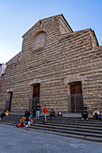 Austere facade of the medieval Basilica di San Lorenzo in Florence, Italy. Medieval churches in Italy at this time typically had very plain facades.