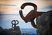 The comb of the wind - Peine del viento sculptures of Eduardo Chillida at the foot of the Igeldo mountain in San Sebastián, Gipuzkoa, Basque country, Euskadi, Spain.