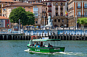 El Gasolino, small boat carrying passengers across the River Nervion, between Portugalete and Las Arenas, Getxo, Vizcaya, Pais Vasco, Spain.