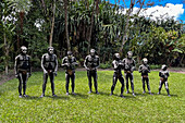 The Skeleton Men from the Omo Bugamo tribe of Papua New Guinea paint their bodies with black and white paint emulating the human skeleton, Chimbu Province, Papua New Guinea