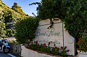 A ceramic tile welcome sign for the resort town of Praiano on the Amalfi Coast, Italy.