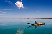 Fishermen in the waterfront beach in Île-à-Vache, Sud Province, Haiti