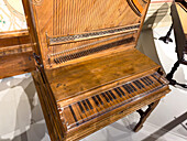 An original upright piano by Domenico del Mela in the Accademia Gallery in Florence, Italy. circa 1739. This is probably the first piano ever built with this vertical design.