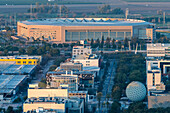 Overlooking the Estadio de La Cartuja, the modern architecture contrasts with the surrounding landscape in Seville, Spain.