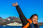 Inuit staff in the silversea Endeavor in the coast of East Greenland near Tasiilaq