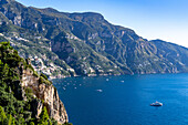 The seaside resort town of Positano terraced on the steep hillside of the Amalfi Coast in Italy.