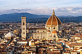 View of the Duomo or Cathedral of Santa Maria del Fiore from the Palazzo Vecchio tower in Florence, Italy.