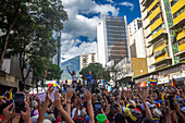 Opposition leader Maria Corina Machado and politician Juan Pablo Guanipa, appear at the opposition rally called by her, in the streets of Caracas.