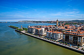 Mouth of the Nervion River from Vizcaya Bridge, a transporter bridge that links the towns of Portugalete and Getxo, Bilbao province, Basque Country, Euskadi, Spain.