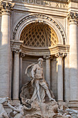 Detail of Oceanus in the Trevi Fountain on the rear of the Palazzo Poli in the Piazza di Trevi in Rome, Italy.