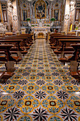 The ceramic tile floor of the nave of the Church of Santa Maria delle Grazie in Sorrento, Italy.