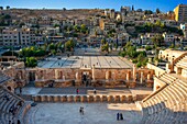 Roman amphitheater and cityscape view of capital Amman, Jordan, Middle East, Asia