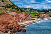 Iles de la Madeleine cliffs overlooking a sandy beach in the Iles de la Madeleine, Quebec, Canada