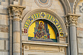 Gold mosaic depicting John the Baptist over the right portal of the west facade of the Duomo of Pisa. Pisa, Italy. Created by Giuseppe Modena da Lucca.