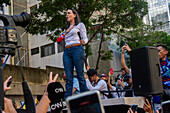 The leader of the opposition Maria Corina Machado, appears at the rally of the opposition called by her, in the streets of Caracas.