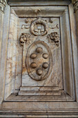 The Medicii coat of arms on the Giovanni delle Bande Nere monument in the Piazza San Lorenzo in Florence, Italy. Giovanni was the father of Cosimo I de' Medici.