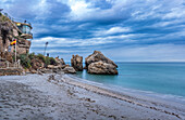 Beautiful beach scene in Nerja, Andalusia featuring the famous Balcon de Europa landmark.