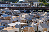 Blocks of marble in the storage yard of a marble supplier in Carrara, Italy.