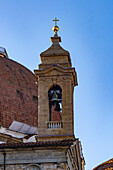 The campanile or bell tower of the medieval Basilica di San Lorenzo in Florence, Italy.