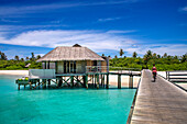 Luxury ower water villas of Six Senses Laamu maldives luxury resort villas, Laamu Atoll region Maldives