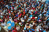 Inside the church of Our Lady of Mount Carmel. Haiti Voodoo Festival in Saut d'Eau, in Saut d'Eau, Ville Bonheur, Haiti. Thousands of both Vodou and Catholic followers gathered under the Saut d'Eau waterfall in Haiti. The pilgrimage, made by Voodou practitioners and Catholics alike, originated with the sighting of the likeness of the Virgin Mary on a palm leaf close to the falls half a century ago. Catholism and Voodou practices are forever intertwined in its Haitian form. The appearance of a rainbow beneath the falls is said indicate that Danbala - the great lord of the waterfall - and Ayida 