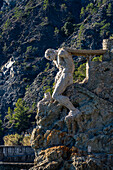 Il Gigante, the Giant of Villa Pastine, a statue on the shore of Monterosso al Mare, Cinque Terre, Italy.