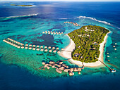 Aerial view of the luxury ower water villas of Six Senses Laamu maldives luxury resort villas, Laamu Atoll region Maldives