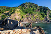 San Juan de Gaztelugatxe, Dragon-stone in Game of Thrones, bridge and stone stairs, Bermeo, Basque Country, Euskadi, Euskaerria, Spain.