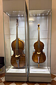 A five-string contrabbasso and a smaller three-string bass in the Accademia Gallery in Florence, Italy. circa mid 1700s. The larger bass is thought to have been built by Bartolomeo Cristifori.