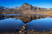 Mountain reflection in the lake in the flower valley in Tasiilaq, also known as Ammassalik, East Greenland, Greenland