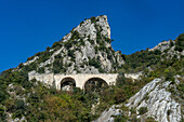 A stone road viaduct in the Torano Valley near the marble quarries of Carrara, Italy.