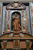 The tomb of Ferdinando I in the Chapel of the Princes in the Medici Chapel Museum in Florence, Italy. The sarcophagus is made of porphyry stone.