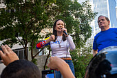 Opposition leader Maria Corina Machado and politician Juan Pablo Guanipa, appear at the opposition rally called by her, in the streets of Caracas.