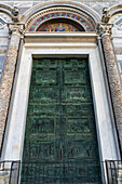 Doors of the main portal of the Duomo of Pisa. Cast in bronze in 1605 by Giambologna. Pisa, Italy.