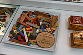 Strips of wood pieces for making inlaid and wood laminate art pieces in a workshop in Sorrento, Italy.