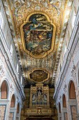 Painted ceiling and organ pipes in the loft of the Cathedral of Saints Philip and James in Sorrento, Italy.